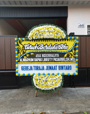 Papan Bunga Duka di Geya
